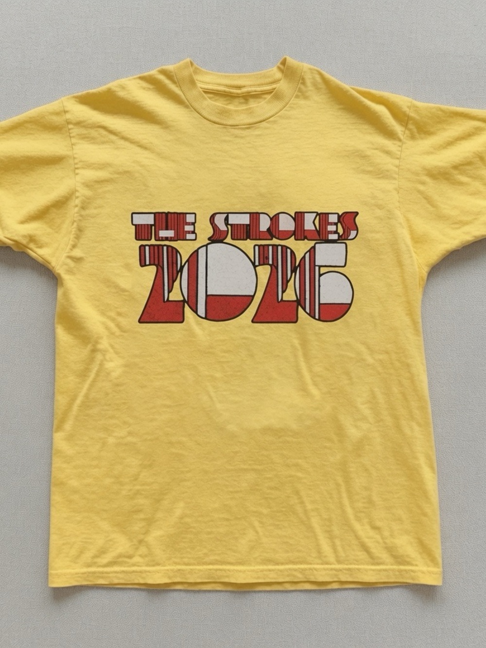 Yellow Graphic Tee with Bold Red/White 2026